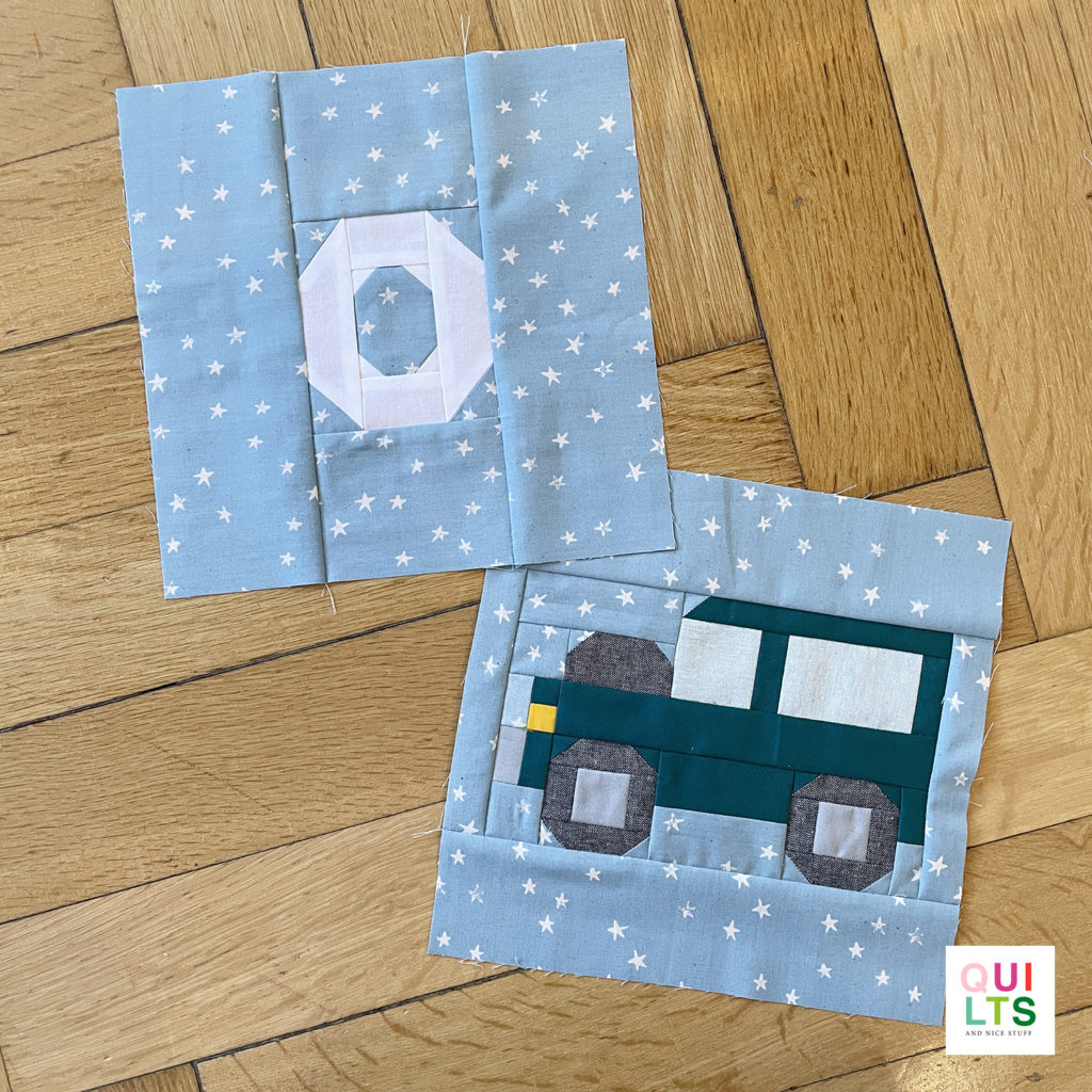 Letter-Vehicle Quilt letter block o und vehicle block off-road car liegt auf Parkett 