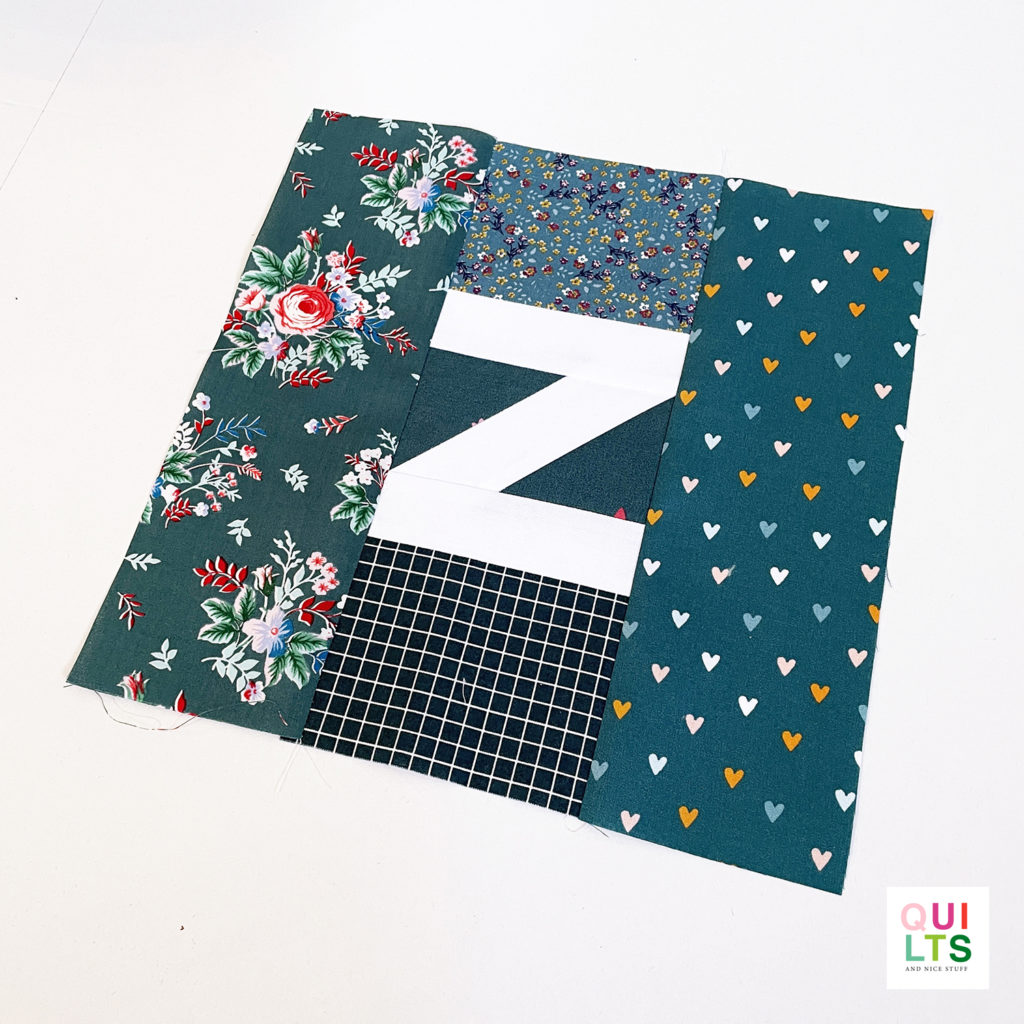 Scrappy Letter Quilt Block z auf weiß