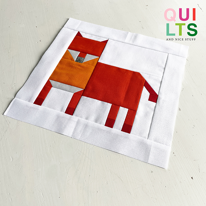 Fuchs Quilt Block auf weißem Hintergrund